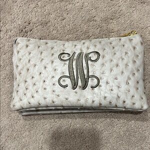 Elegant Cream Clutch with Embossed Design